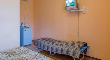 Двухместный номер Делюкс с 1 кроватью (на 2 взрослых + 1 ребенка) в Гостевом доме На Новороссийской